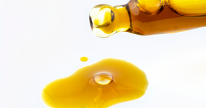 Cannabis oil with color improved through color remediation.
