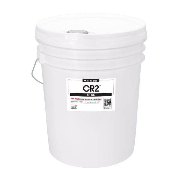 A white bucket full of CR2 filtration media that weighs 18 kilograms.